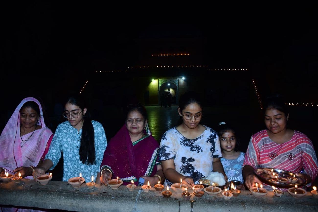 Illuminated temples on Kartik Purnima: Temples and buildings illuminated with lamps on Dev Diwali.