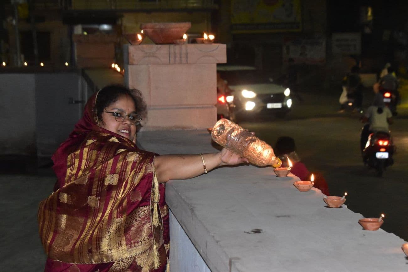 Illuminated temples on Kartik Purnima: Temples and buildings illuminated with lamps on Dev Diwali.